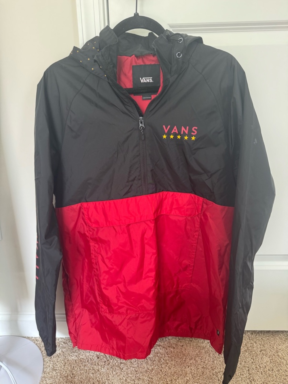 Vans Black Jacket with Red Logo and Yellow Stars